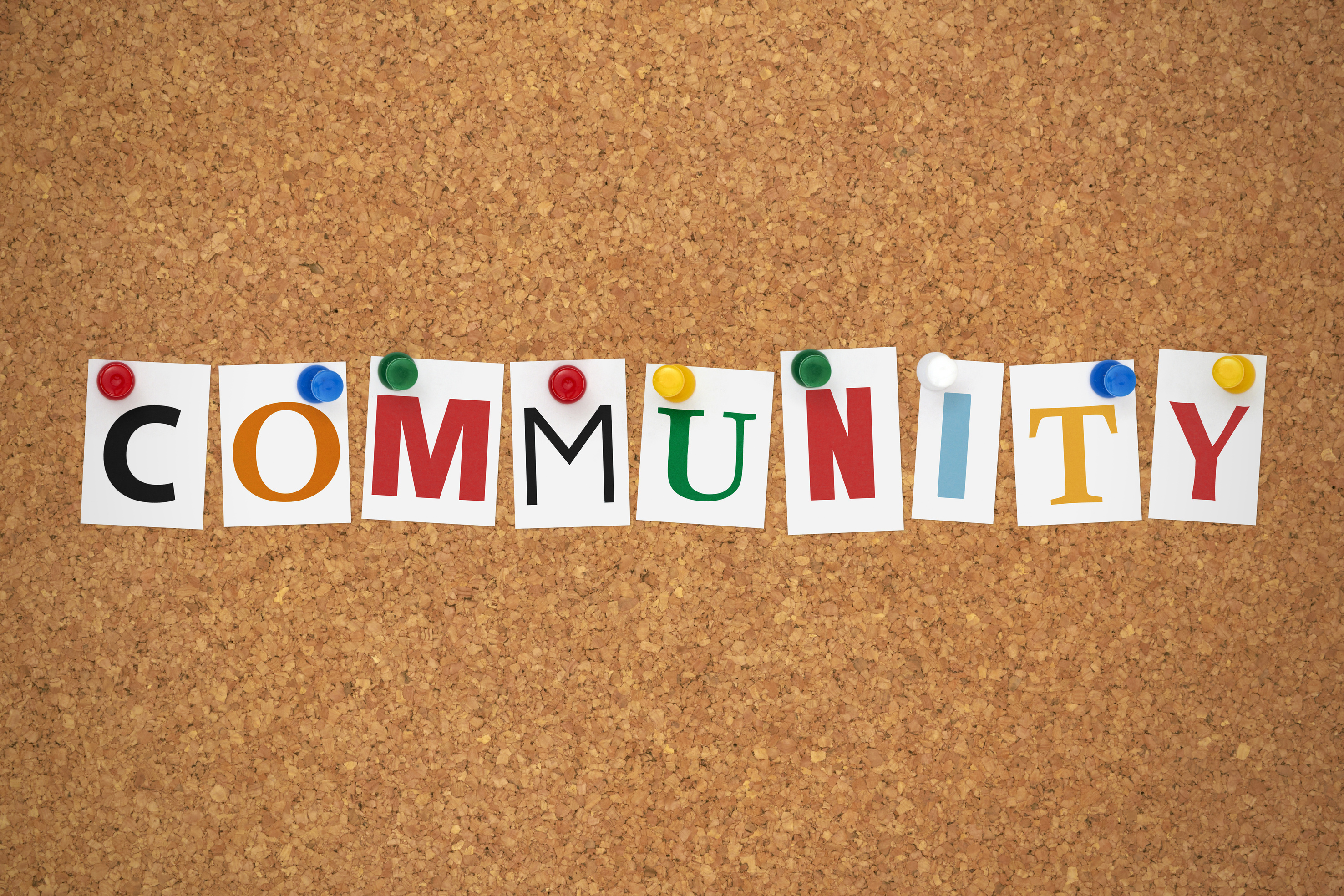 Community letters displayed on a board